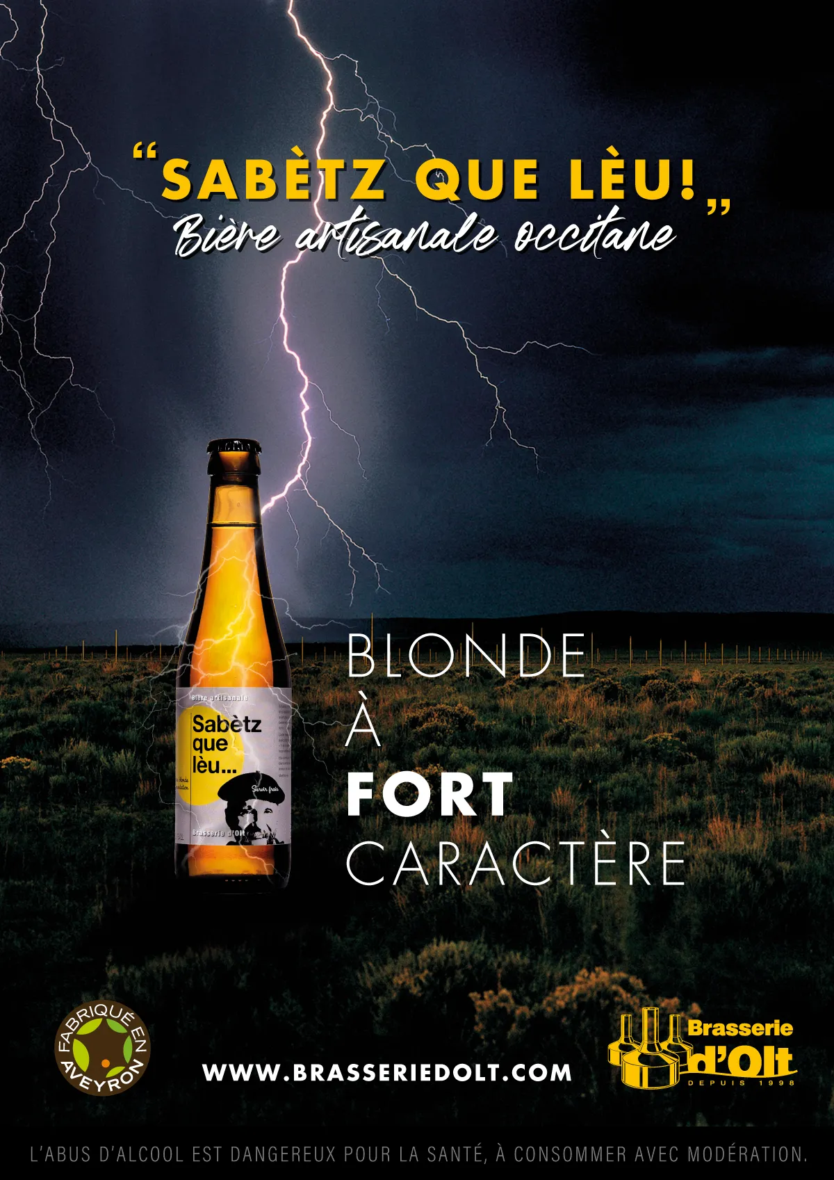 Affiche Sabètz que lèu : « Blonde à fort caractère », la bouteille sous un éclair d’orage